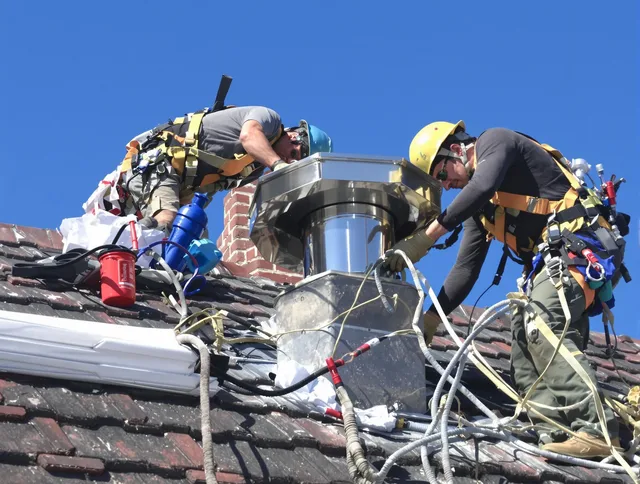 Protective chimney cap installed by Mayfield Heights Chimney Sweep in Mayfield Heights, OH
