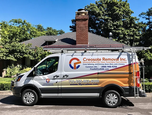 Mayfield Heights Chimney Sweep technician removing creosote safely in Mayfield Heights, OH
