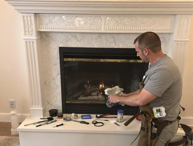 Mayfield Heights Chimney Sweep performing fireplace maintenance in Mayfield Heights, OH